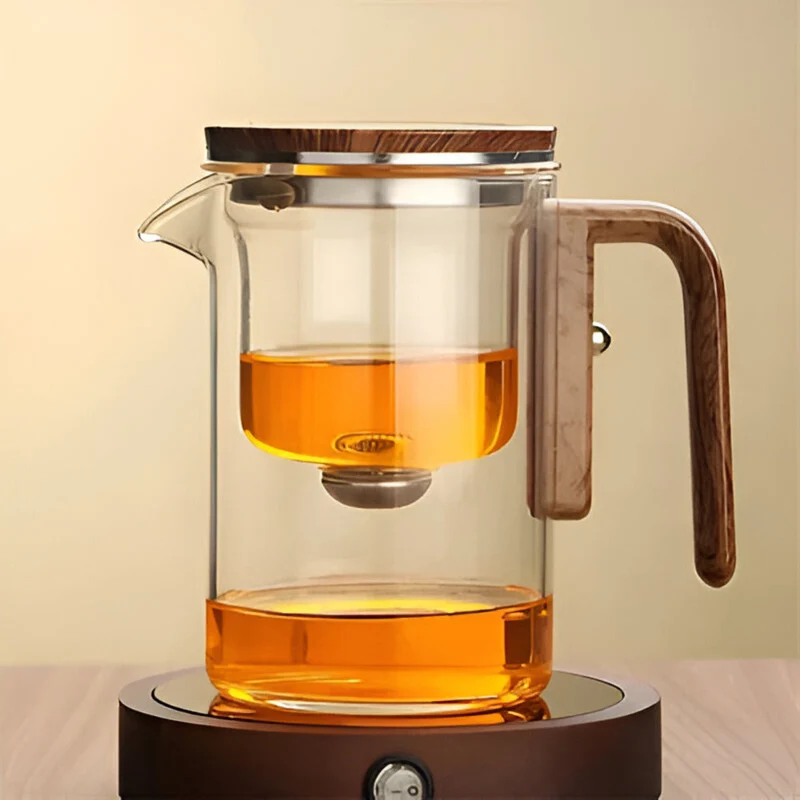 Elegant glas teekande med si - Stilfuldt design til løs te