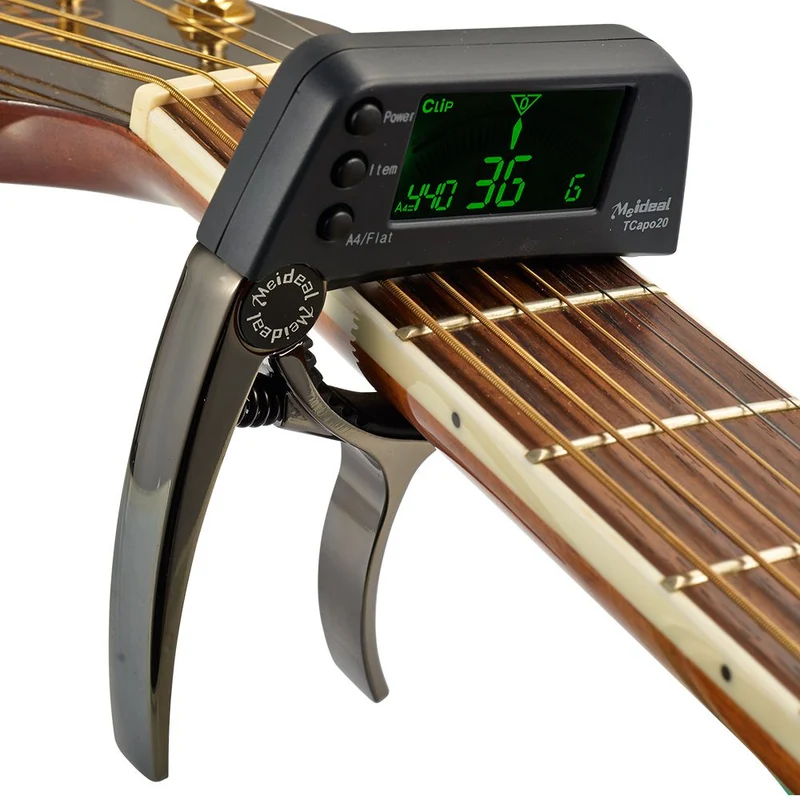 Kombineret Capo og Tuner – StrengFix